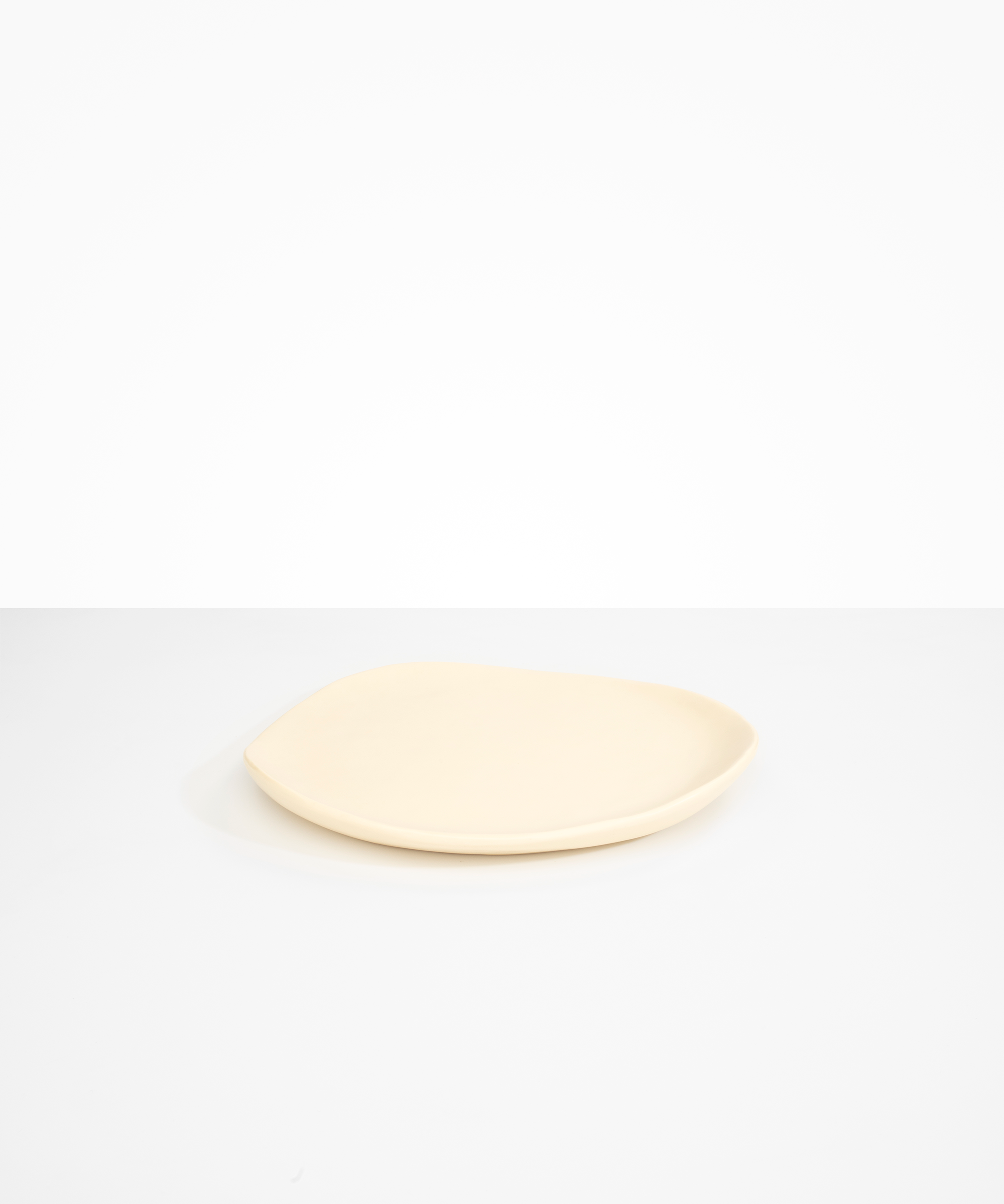 Dinosaur Designs Pebble Plate in Cream Colour resin