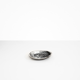 Dinosaur Designs Pebble Side Plate in Black Marble Colour resin.
