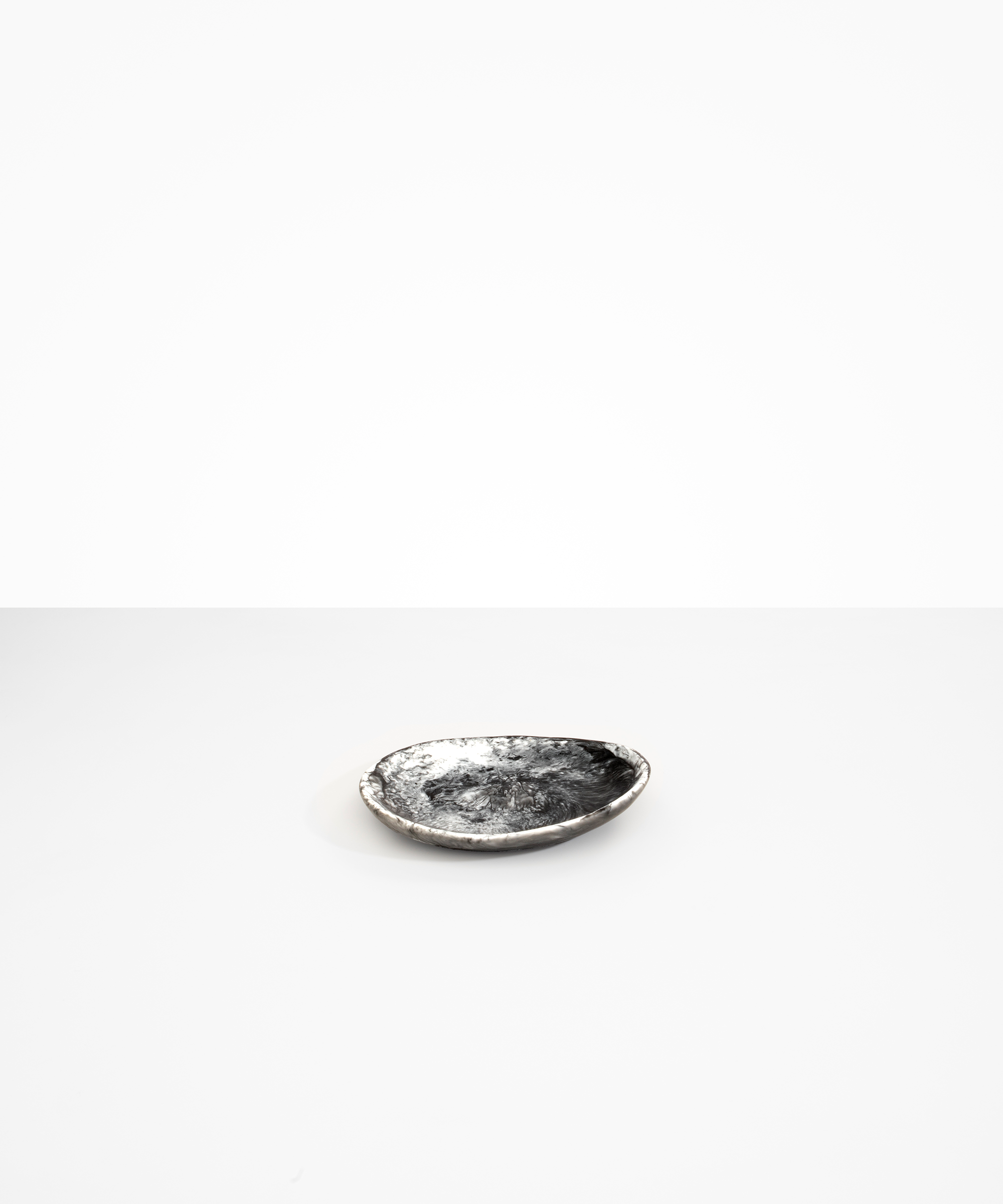Dinosaur Designs Pebble Side Plate in Black Marble Colour resin.