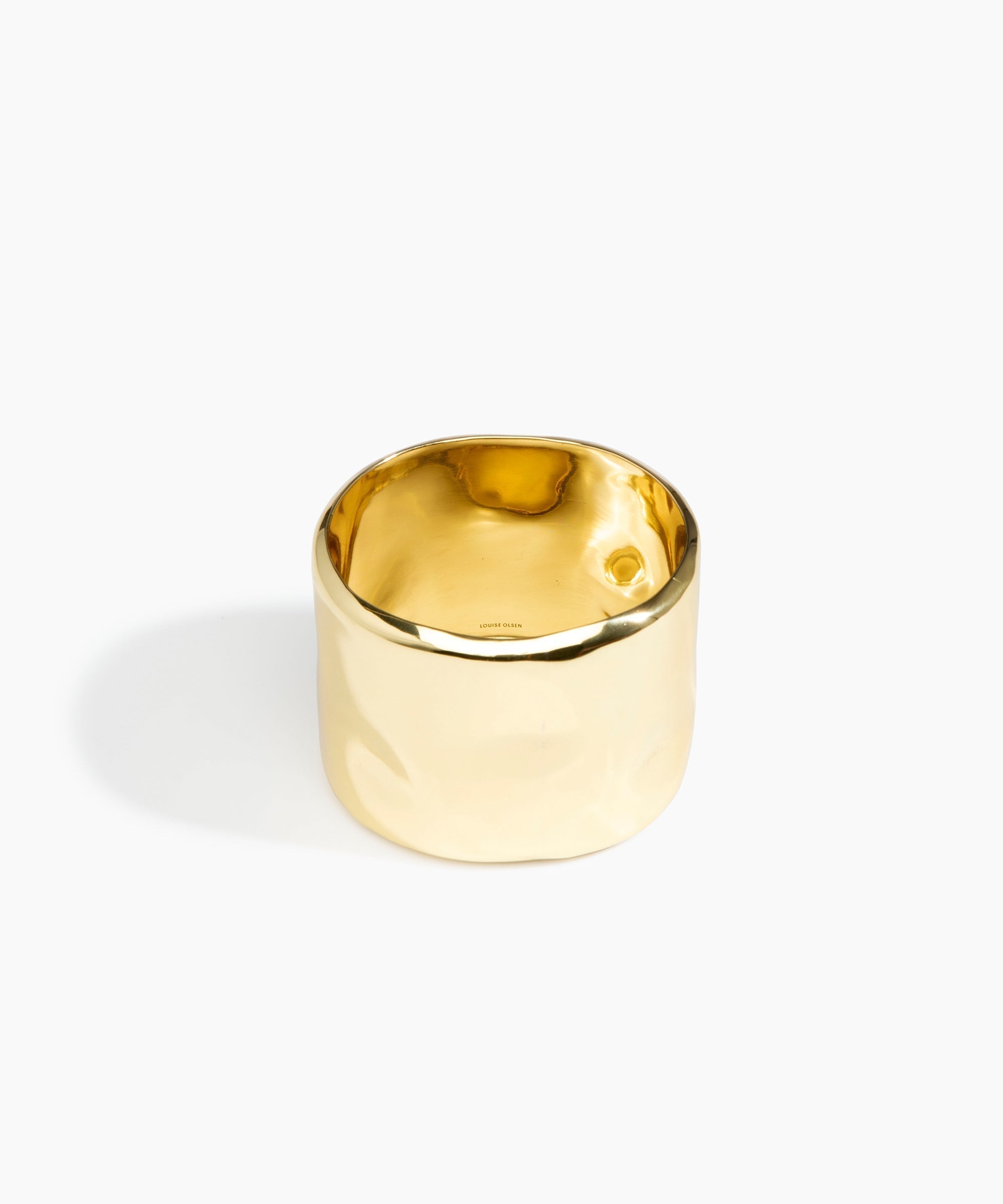 LO Collections Wide Dimpled Bangle in Nano-Coated Brass Material..