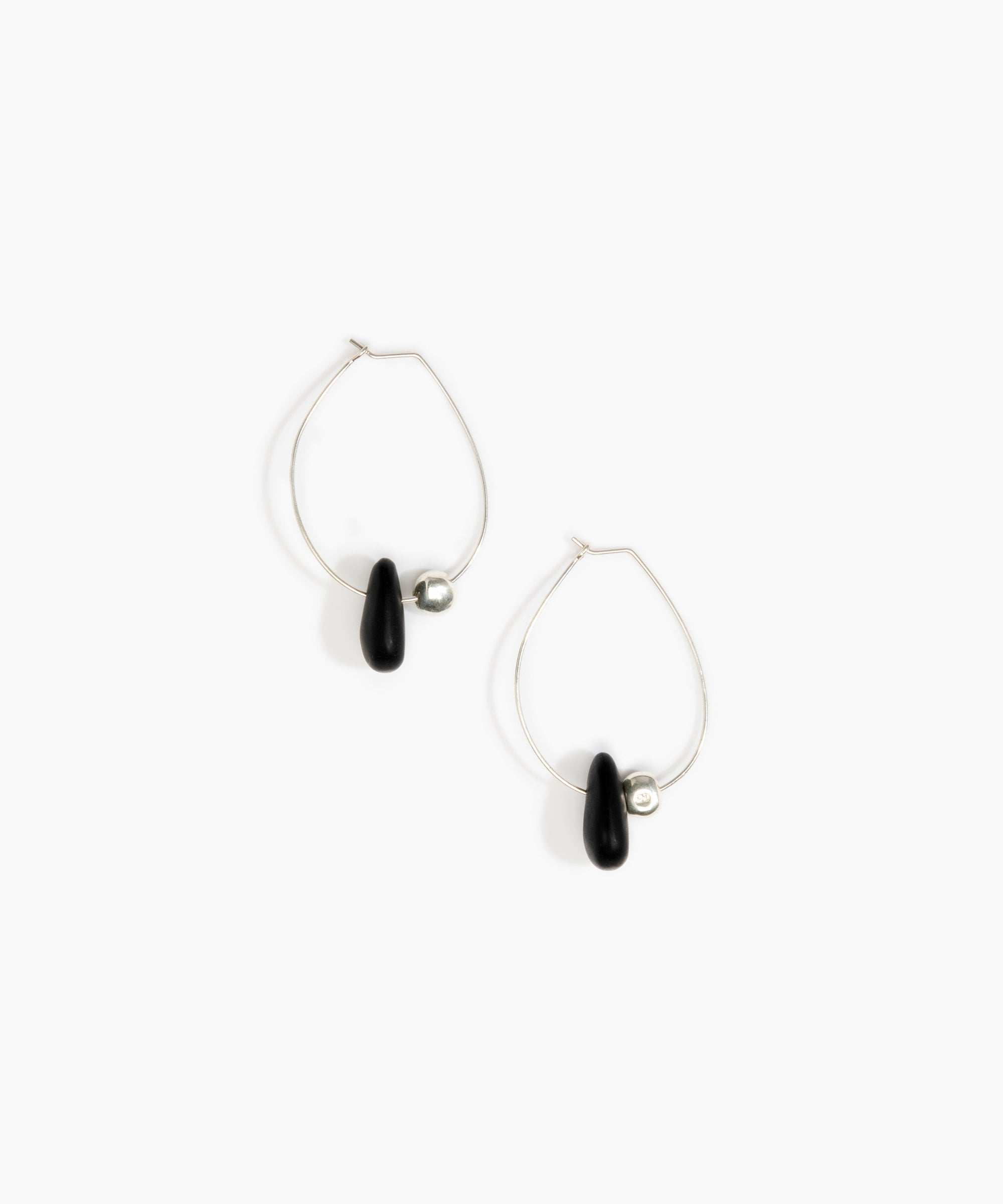 Dinosaur Designs Joie De Vivre Hoop Earrings in Black Colour resin with 925 Sterling Silver Material.
