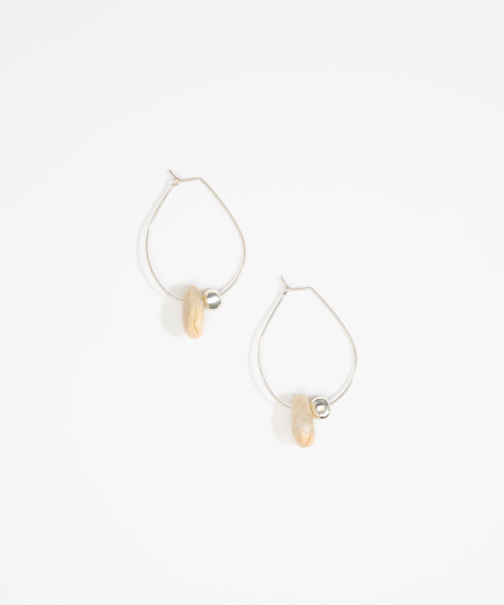 Dinosaur Designs Joie De Vivre Hoop Earrings in Sandy Pearl Colour resin with 925 Sterling Silver Material.