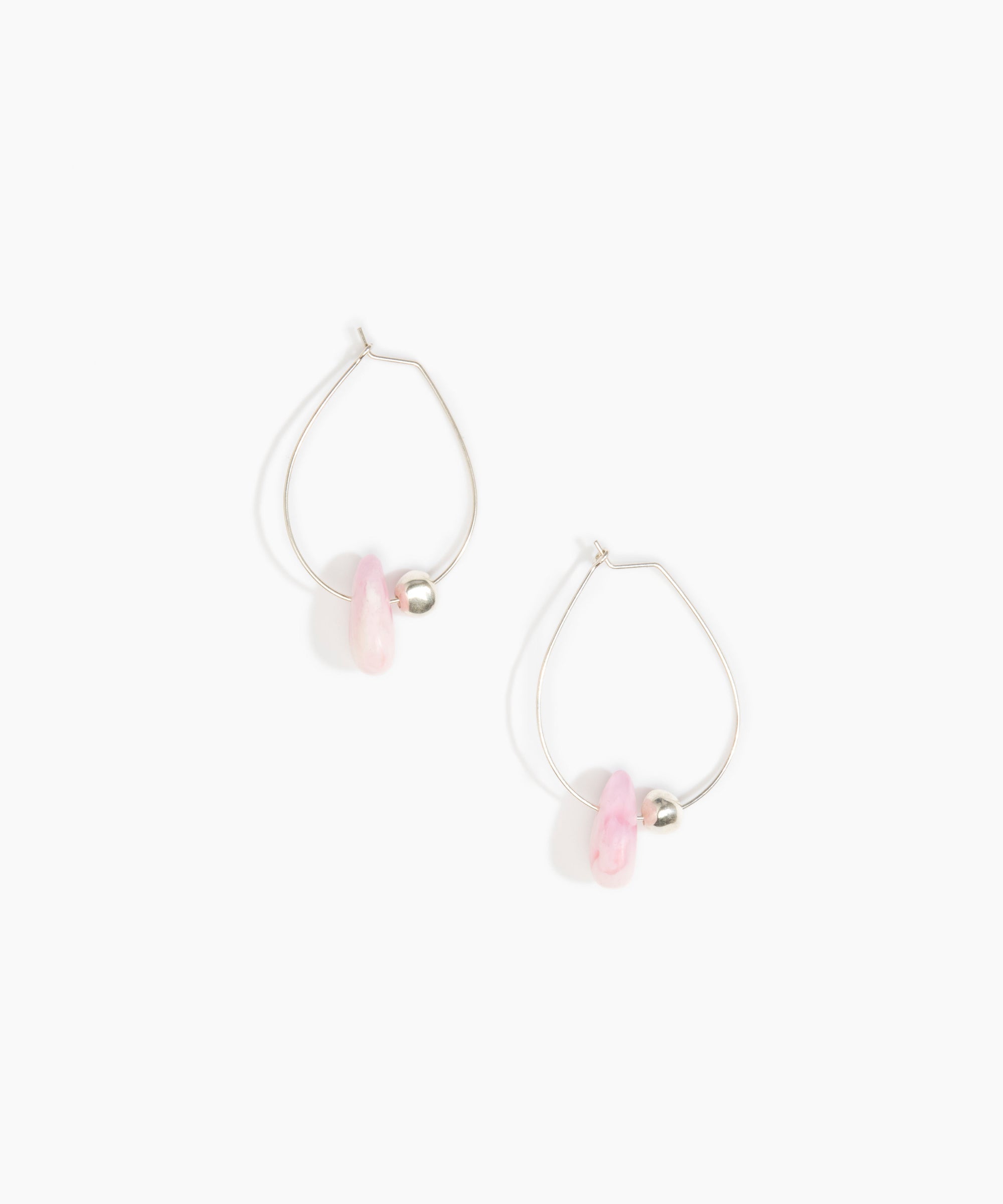 Dinosaur Designs Joie De Vivre Hoop Earrings in Shell Pink Colour resin with 925 Sterling Silver Material.