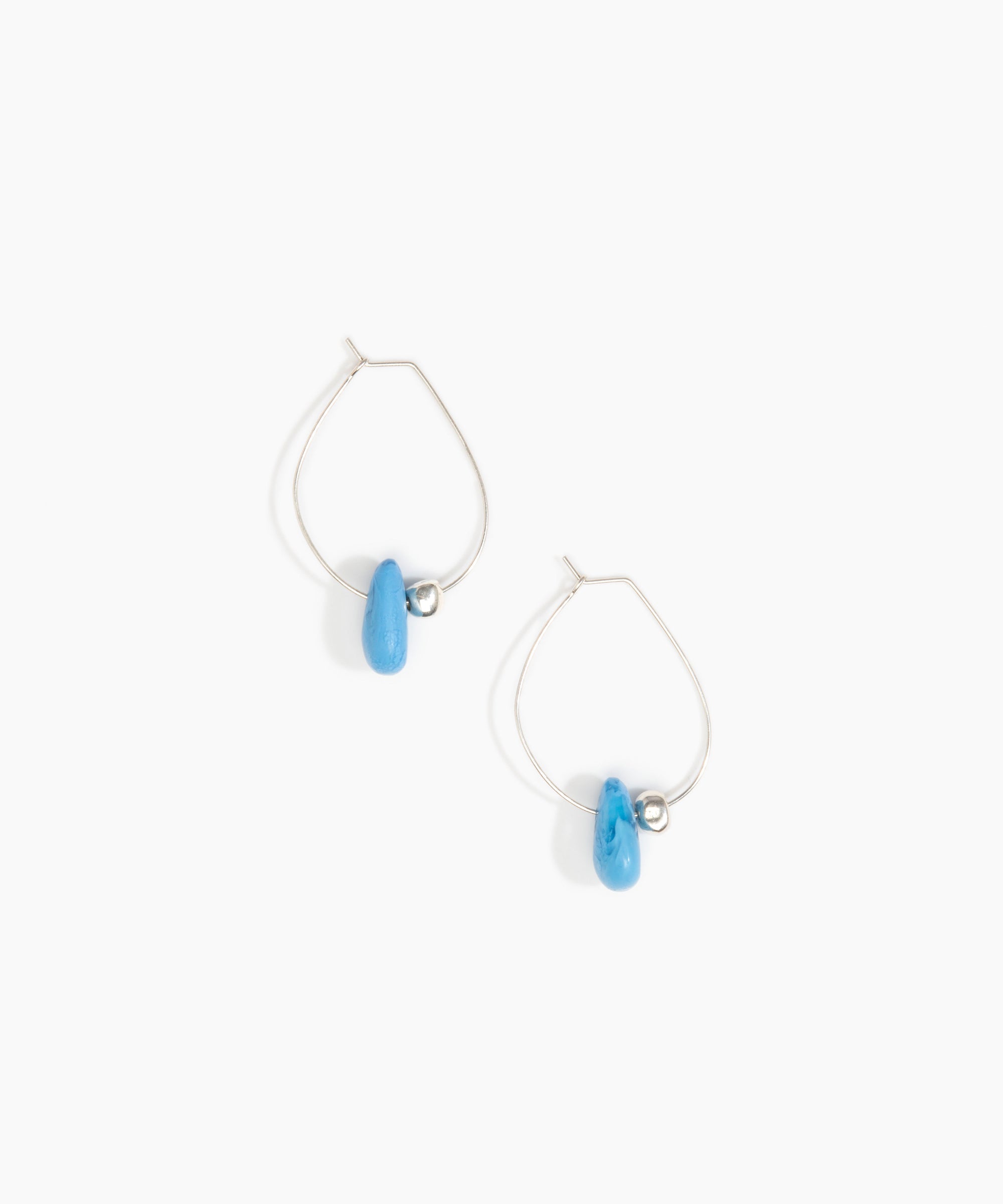 Dinosaur Designs Joie De Vivre Hoop Earrings in Sky Colour resin with 925 Sterling Silver Material.