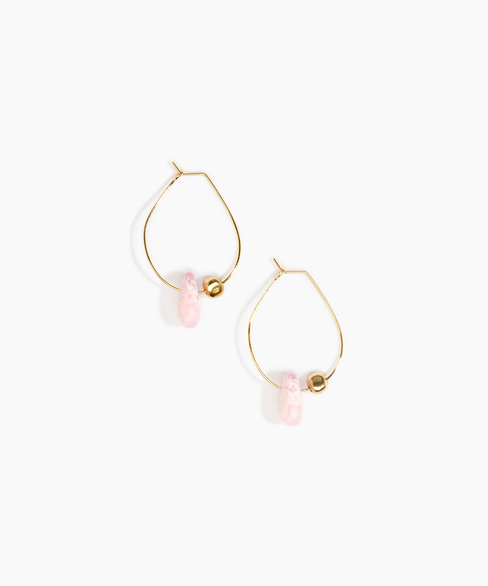 Dinosaur Designs Joie De Vivre Hoop Earrings in Shell Pink Colour resin with Gold-Filled Material.