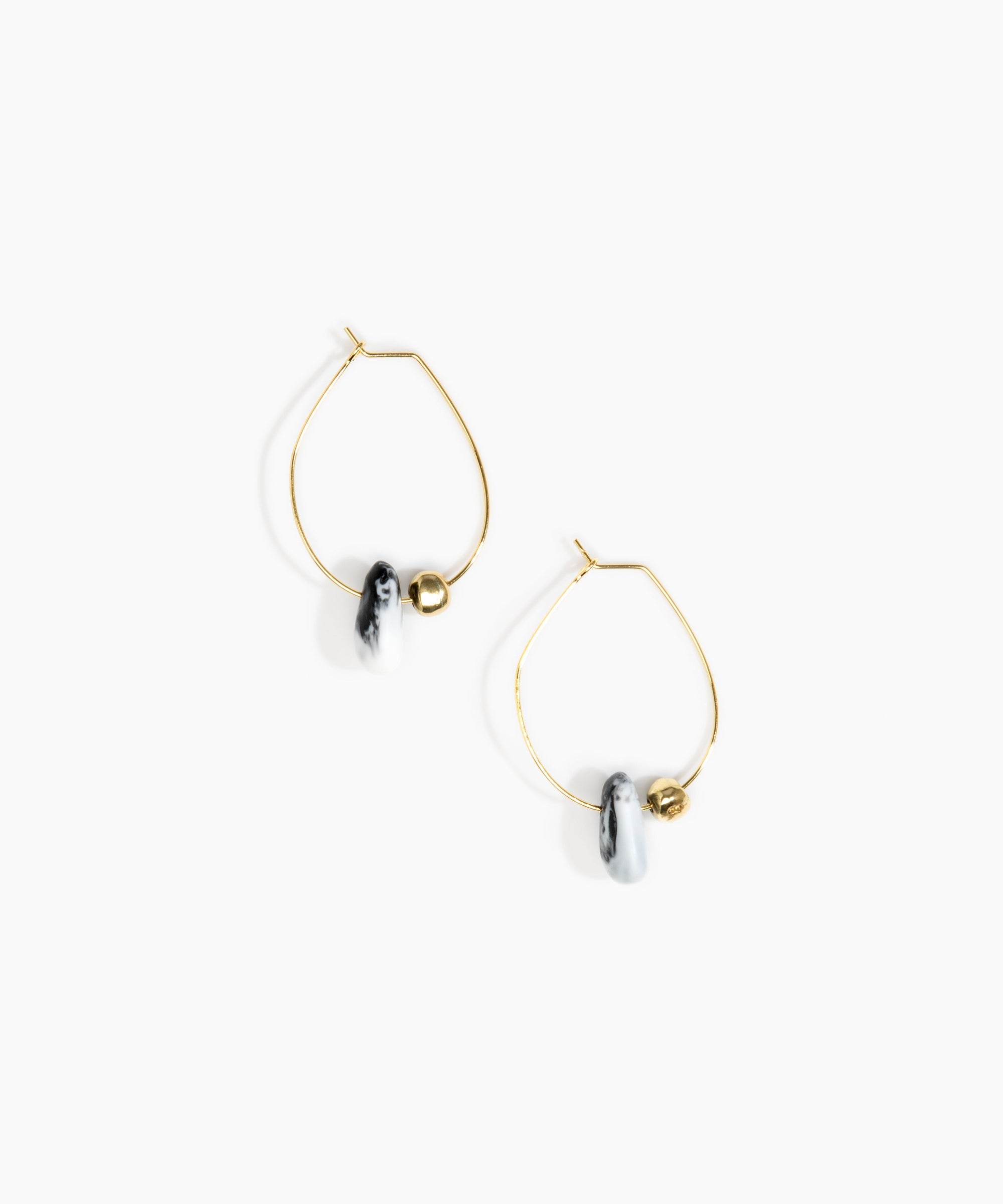 Dinosaur Designs Joie De Vivre Hoop Earrings in White Marble Colour resin with Gold-Filled Material.