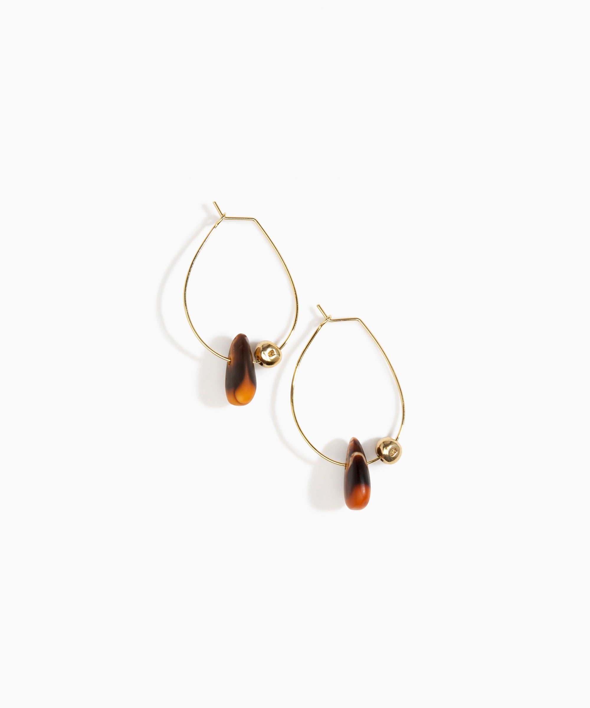 Dinosaur Designs Joie De Vivre Hoop Earrings in Dark Horn Colour resin with Gold-Filled Material.