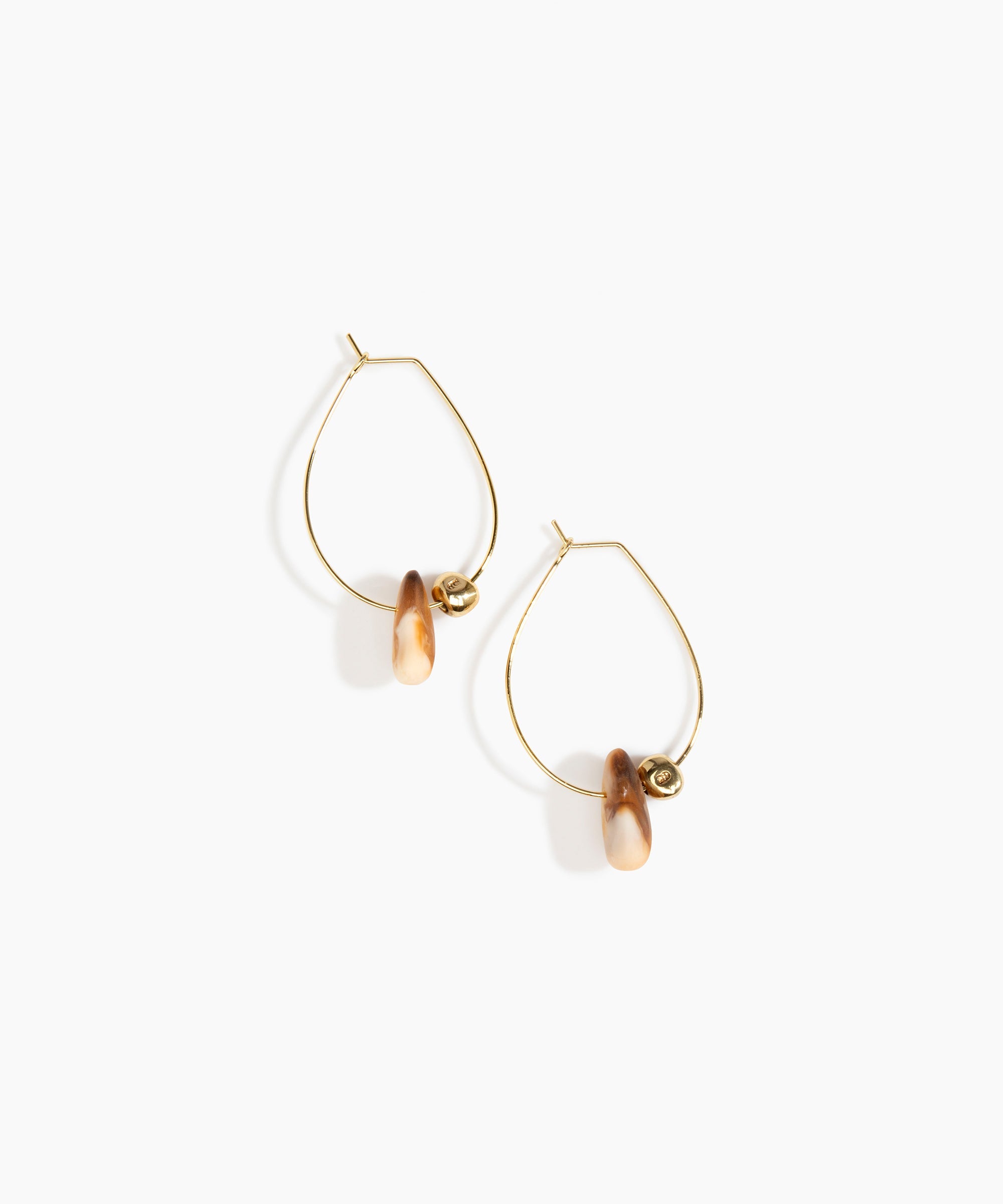 Dinosaur Designs Joie De Vivre Hoop Earrings in Light Horn Colour resin with Gold-Filled Material.