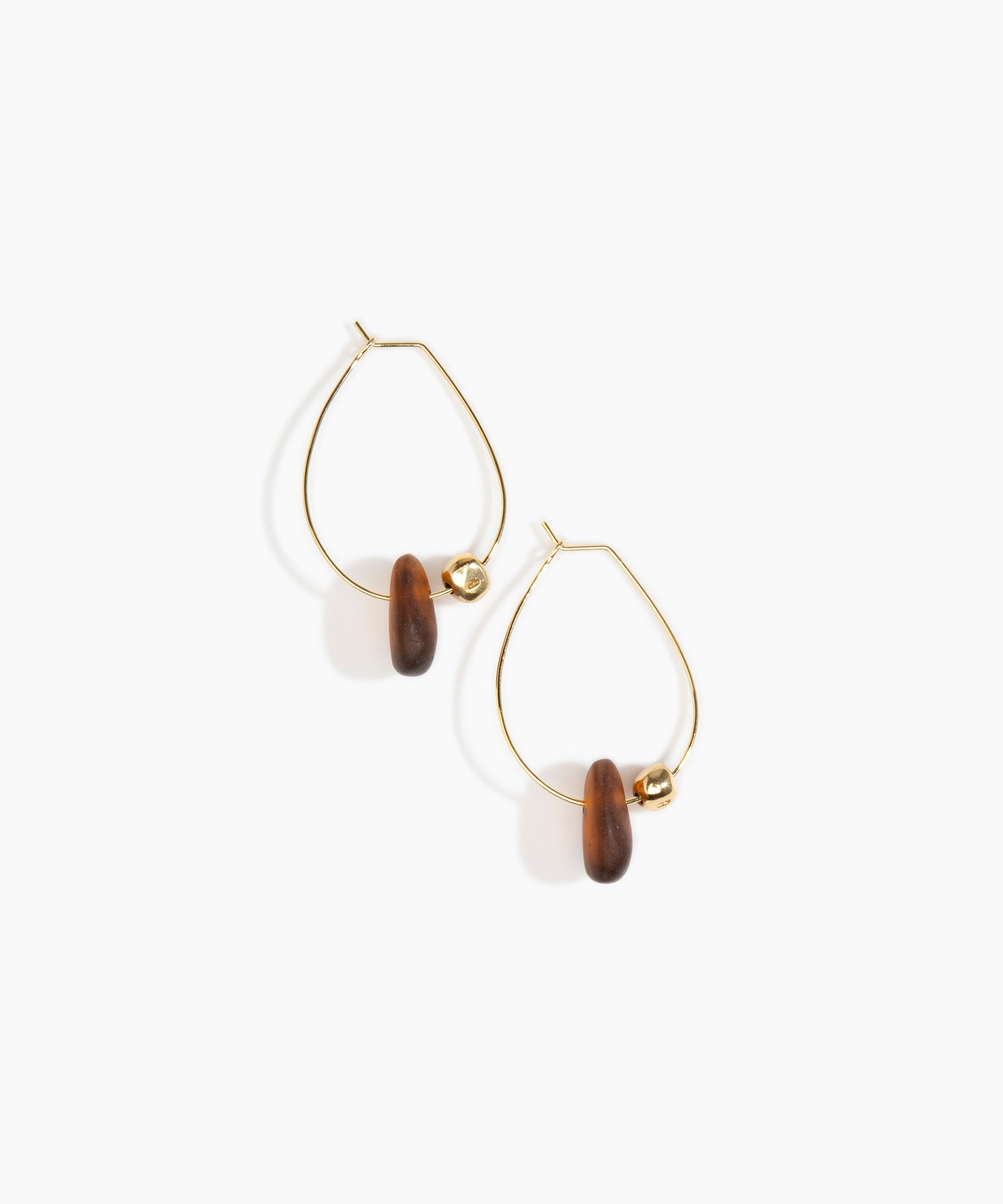 Dinosaur Designs Joie De Vivre Hoop Earrings in Tortoise Colour resin with 925 Sterling Silver Material.