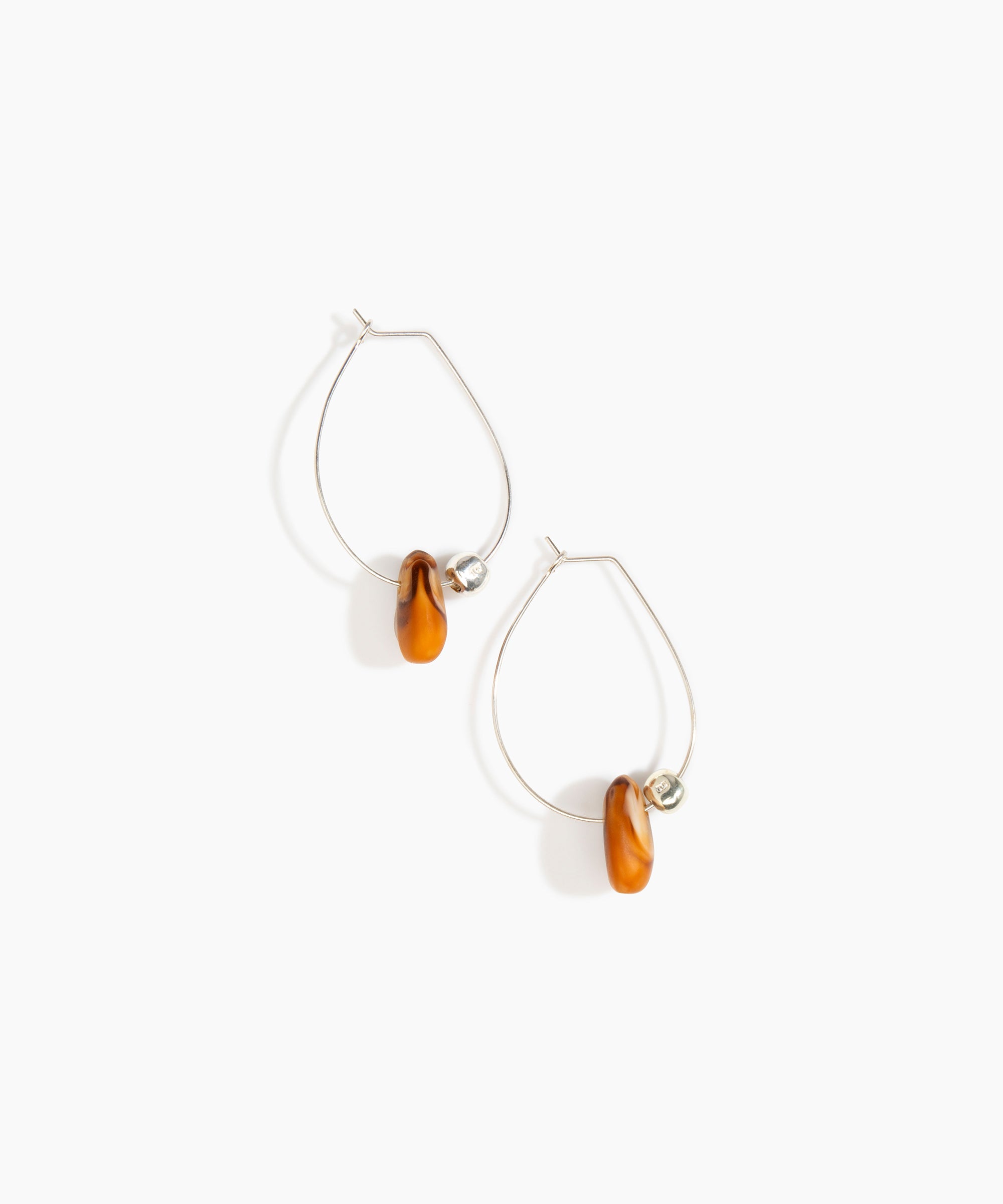 Dinosaur Designs Joie De Vivre Hoop Earrings in Dark Horn Colour resin with 925 Sterling Silver Material.