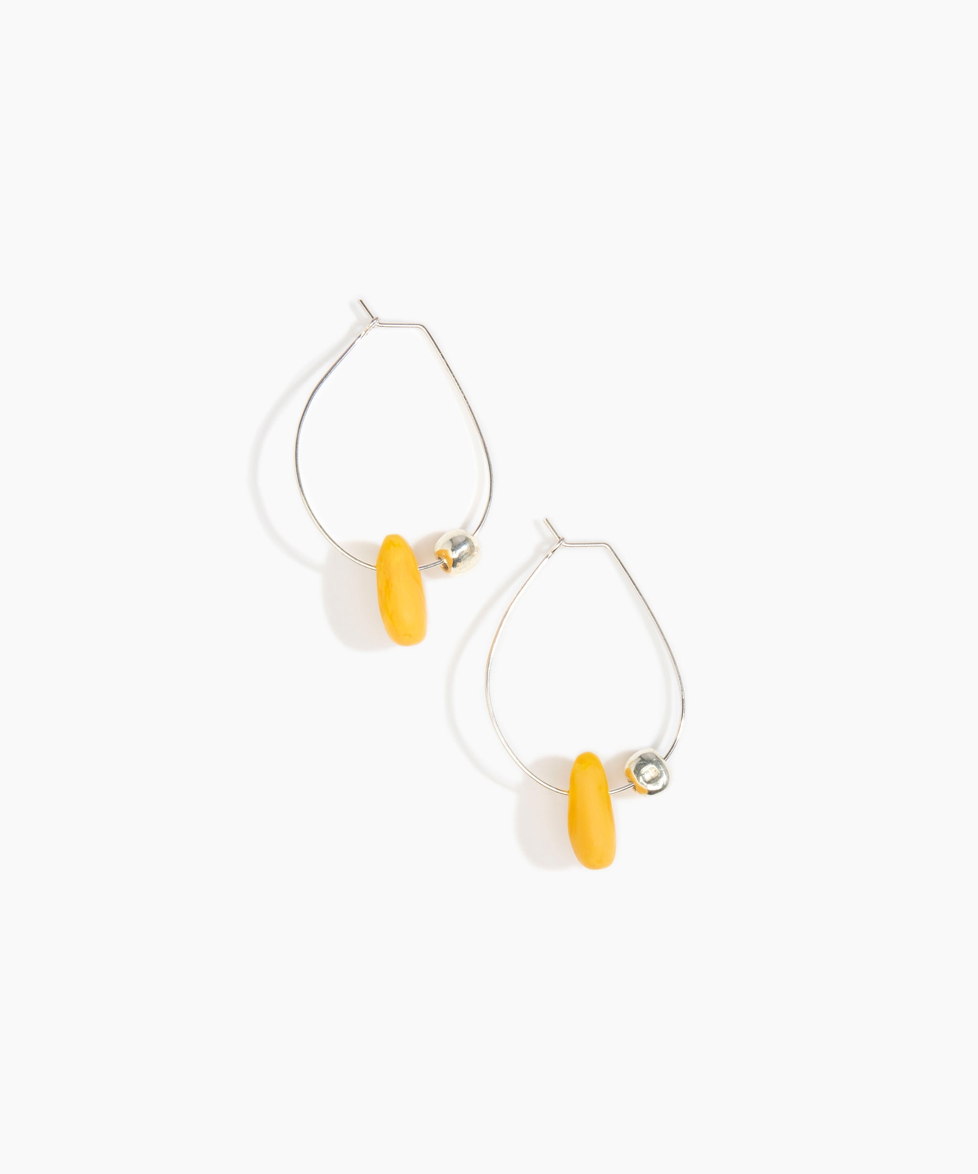Dinosaur Designs Joie De Vivre Hoop Earrings in Honeycomb Colour resin with 925 Sterling Silver Material.