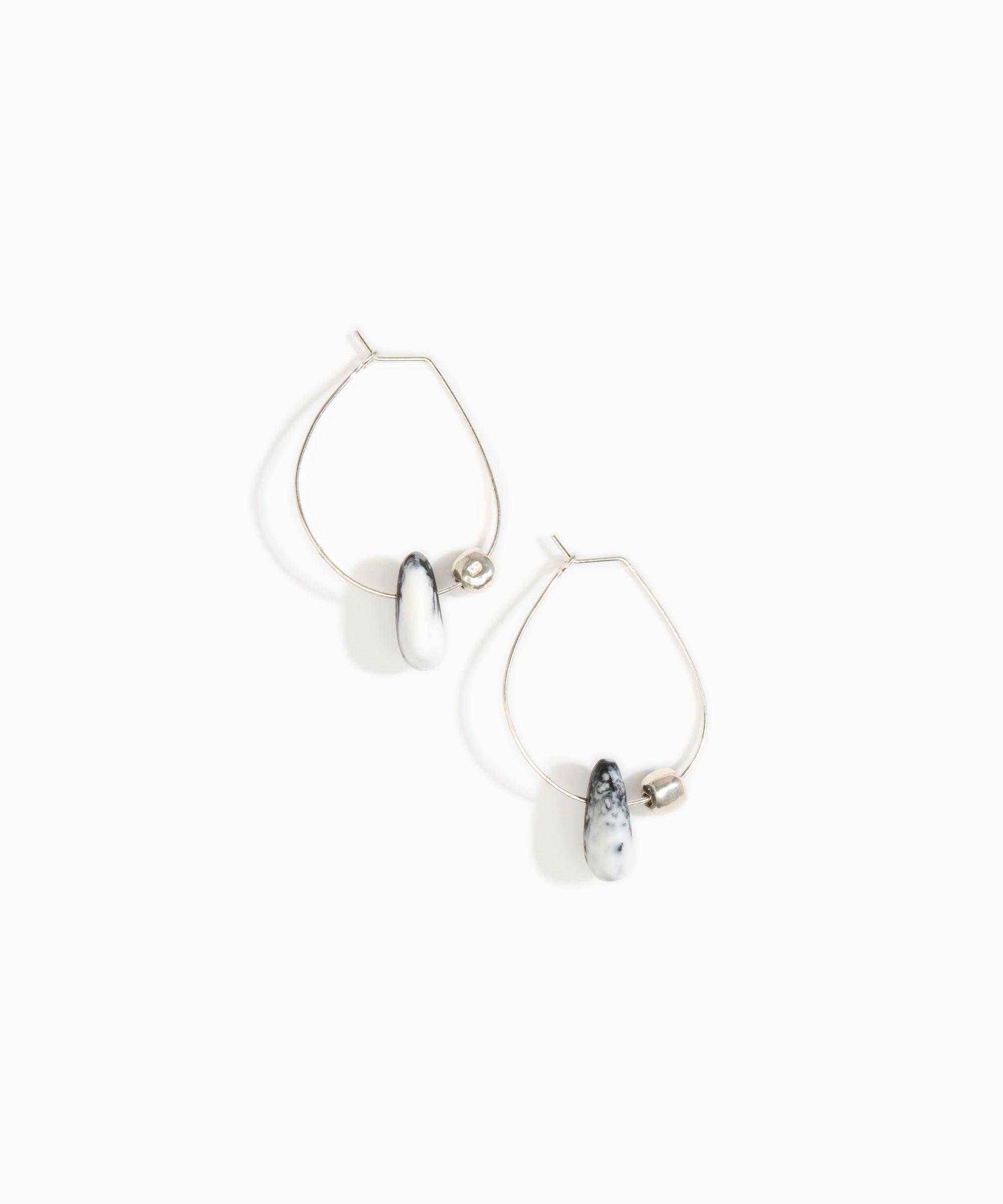 Dinosaur Designs Joie De Vivre Hoop Earrings in White Marble Colour resin with 925 Sterling Silver Material.