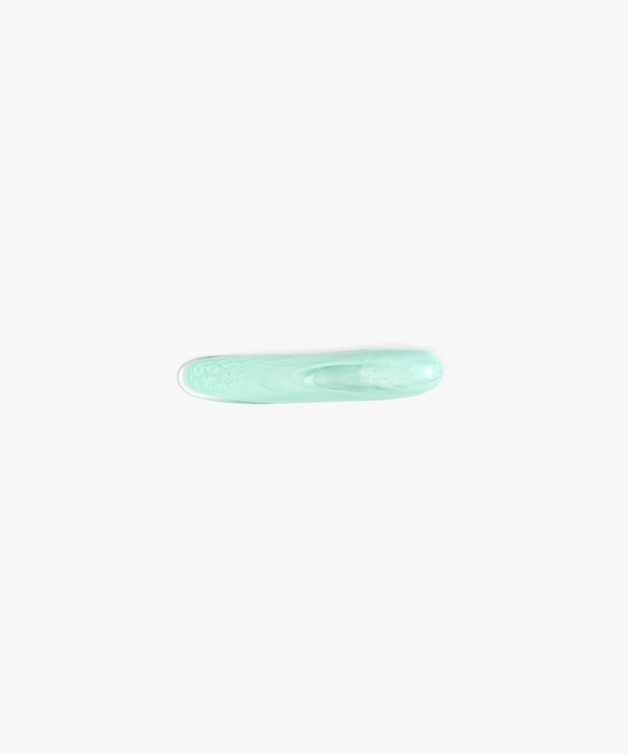 Dinosaur Designs Stone Butter Knife in Mint Colour resin.