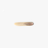 Dinosaur Designs Stone Butter Knife in Sandy Pearl Colour resin.