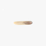 Dinosaur Designs Stone Butter Knife in Sandy Pearl Colour resin
