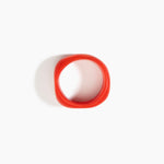Dinosaur Designs Large Organic Bangle Bracelets in Poppy color resin with Narrow Fit