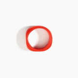 Dinosaur Designs Large Organic Bangle Bracelets in Poppy color resin with Narrow Fit