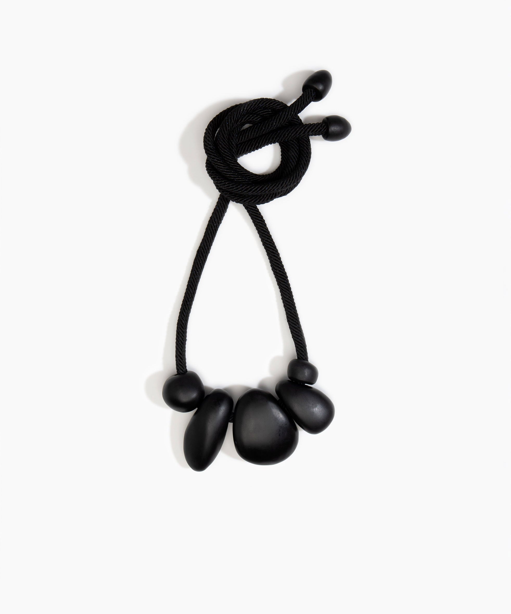 Dinosaur Designs Boulder Rock Necklace in Black color resin