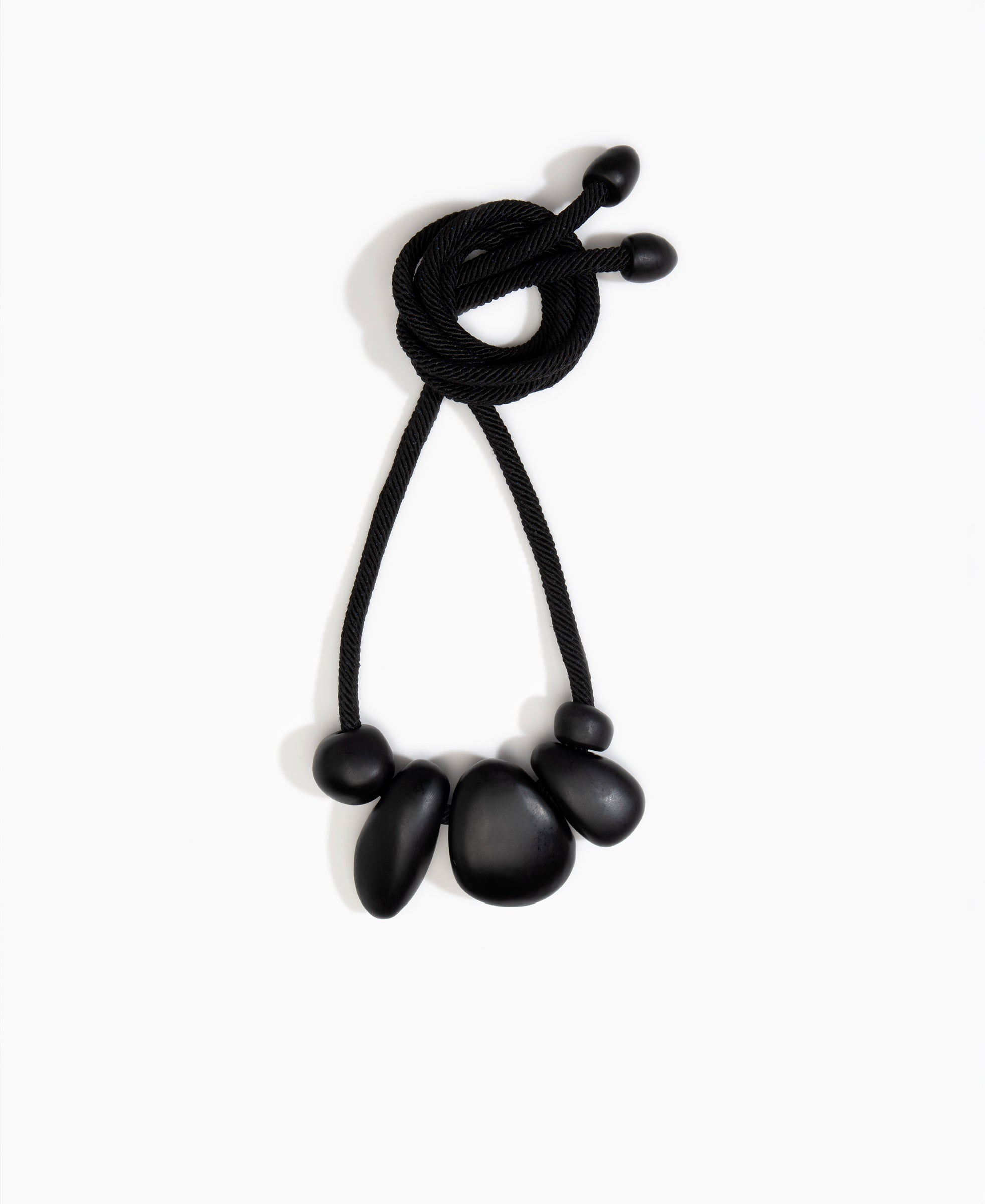 Dinosaur Designs Boulder Rock Necklace in Black color resin