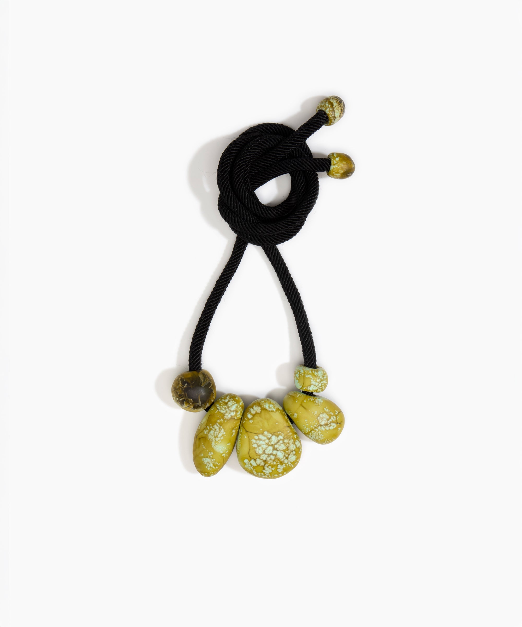 Dinosaur Designs Boulder Rock Necklace in Malachite Colour resin.