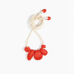 Dinosaur Designs Boulder Rock Necklace in Poppy Colour resin.