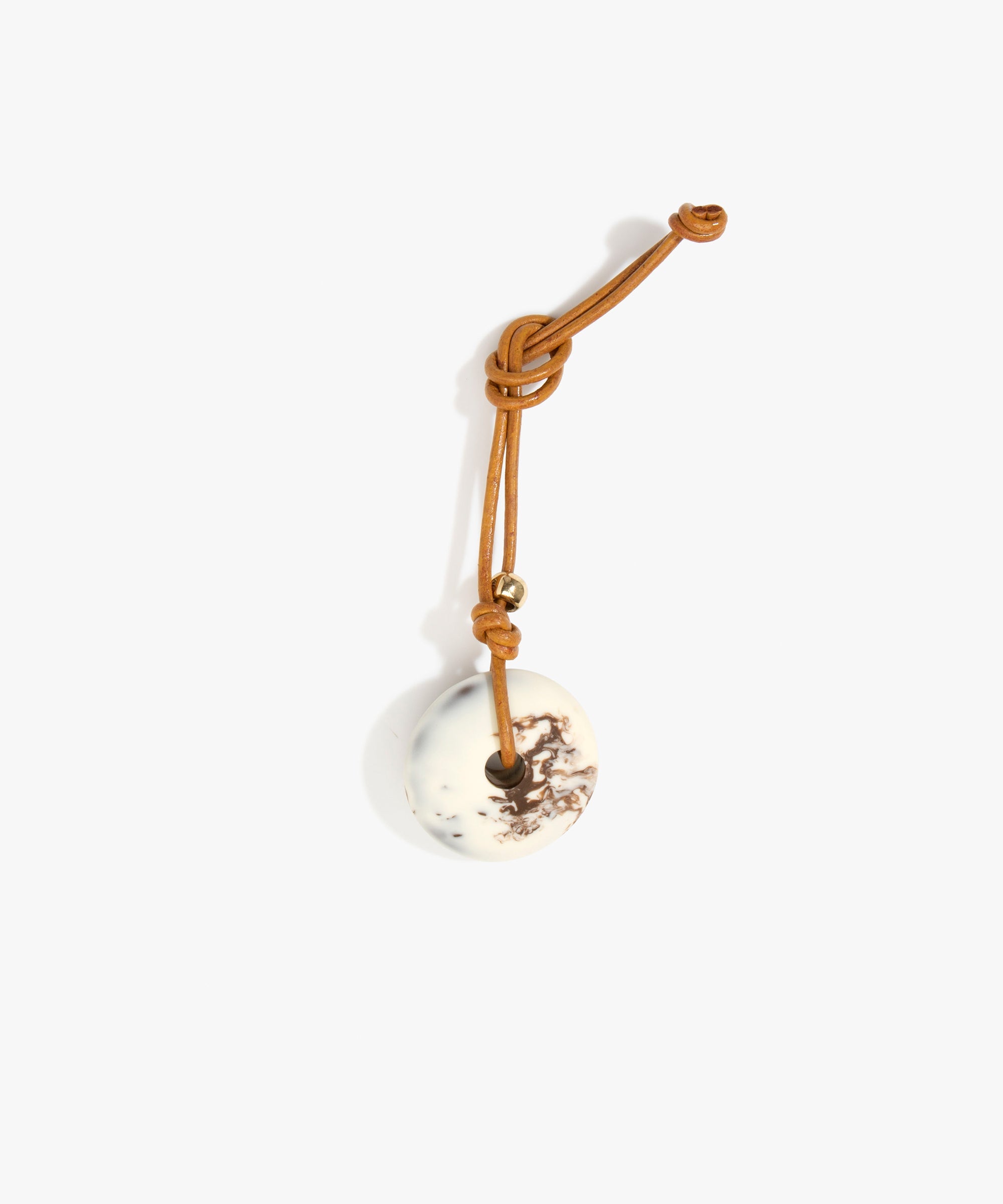 Dinosaur Designs Flat Watercolour Bag Charm in Cappuccino Colour resin with Brass Material..