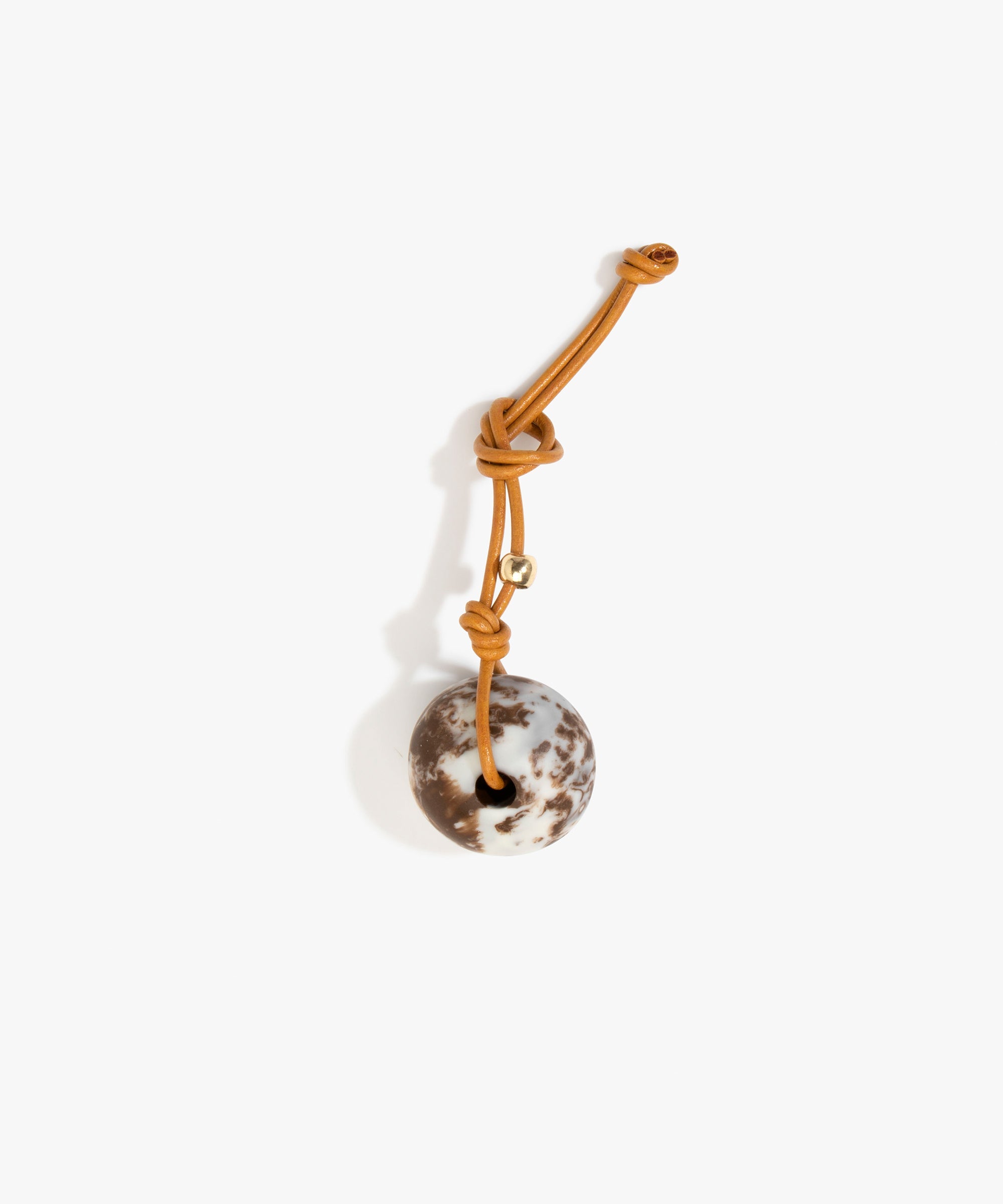 Dinosaur Designs Round Watercolour Bag Charm in Cappuccino Colour resin with Brass Material..