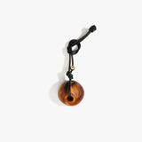 Dinosaur Designs Round Watercolour Bag Charm in Dark Horn Colour resin with Brass Material..
