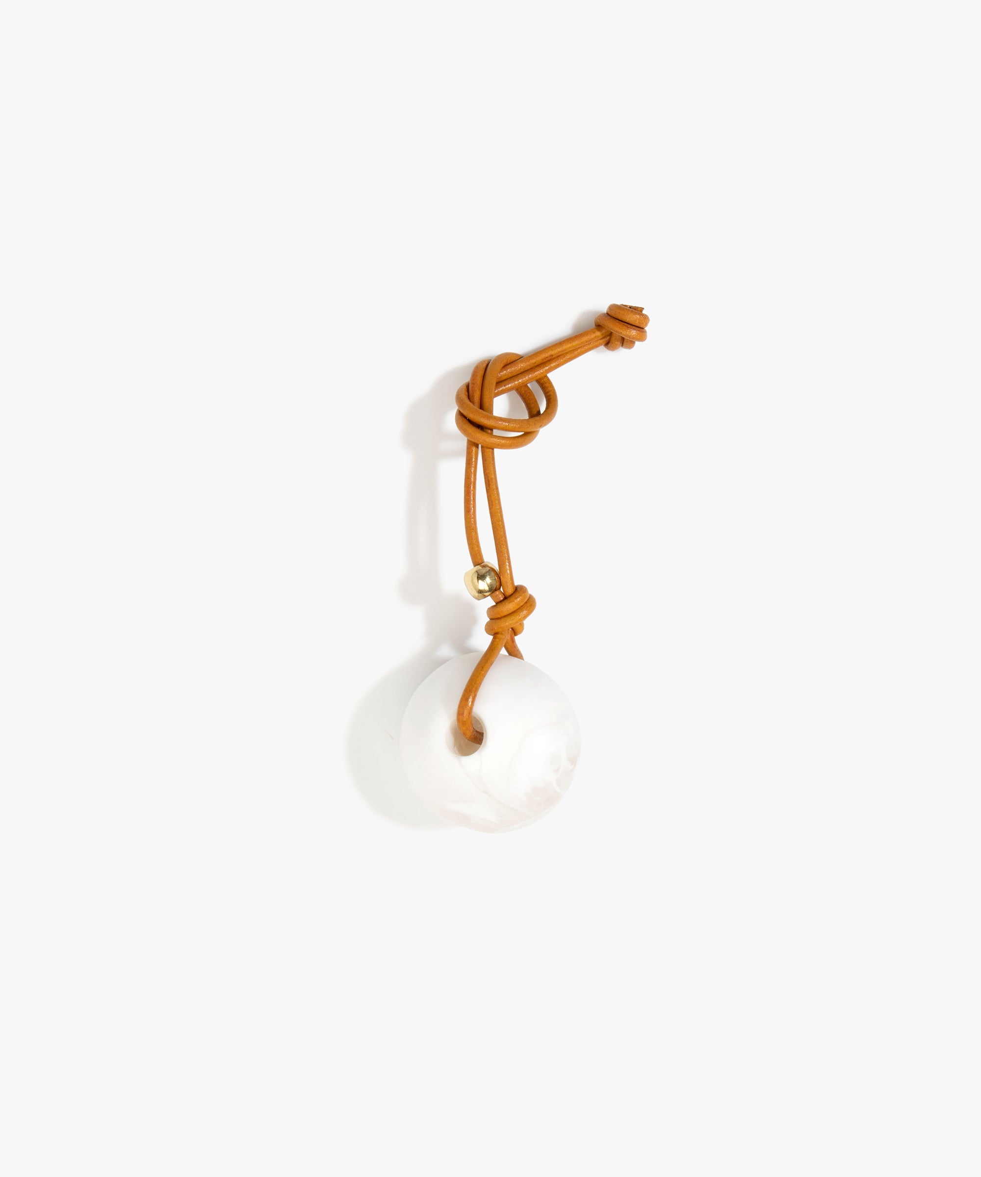Dinosaur Designs Round Watercolour Bag Charm in Snow Swirl Colour resin with Brass Material..