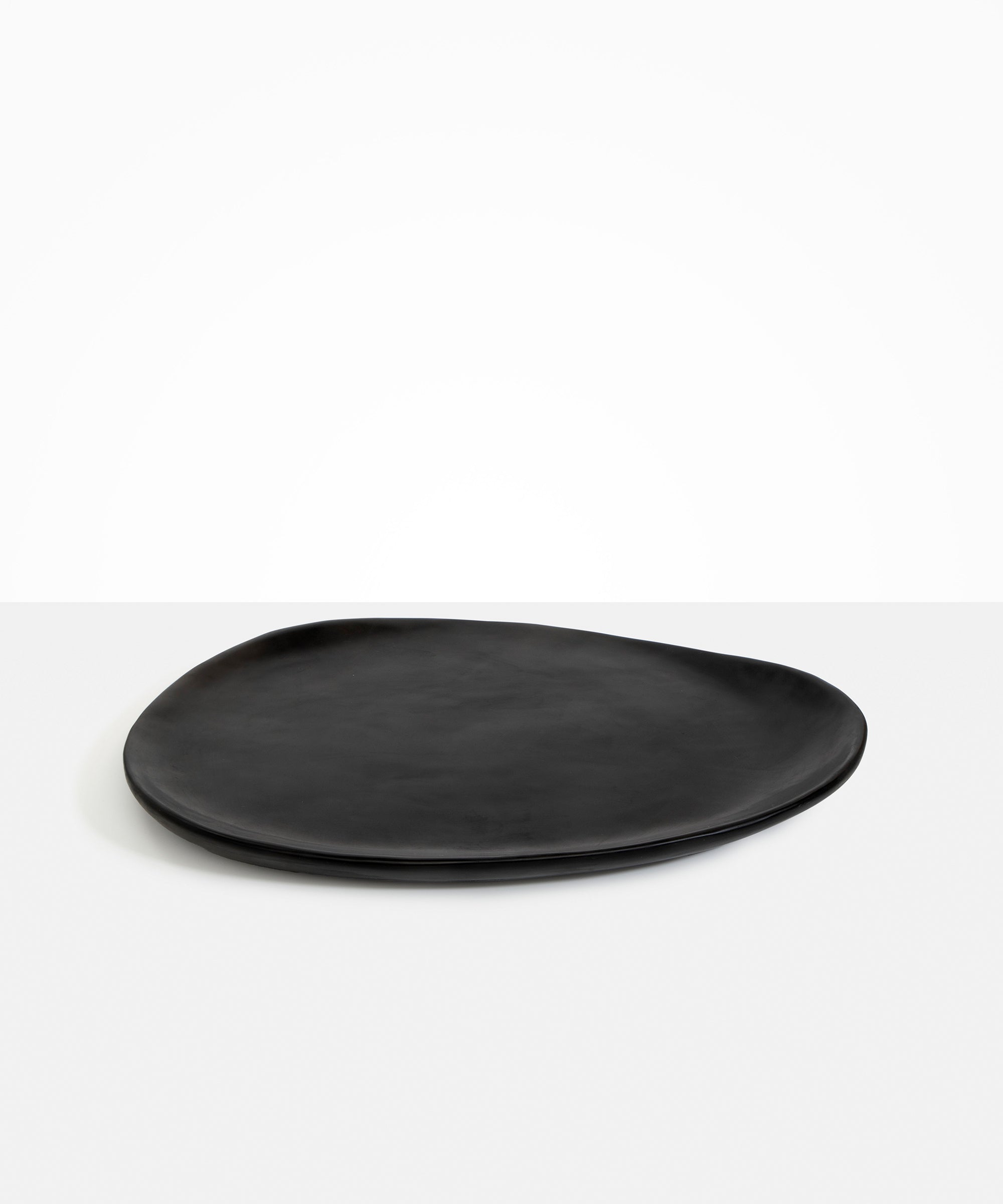Dinosaur Designs Large Pebble Platter in Black Colour resin.