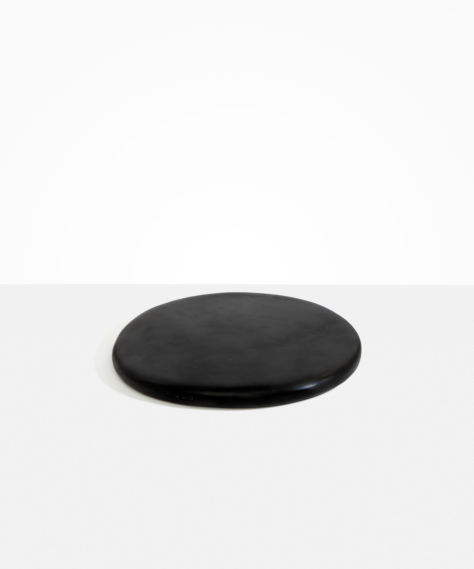 Dinosaur Designs Temple Cheese Platter in Black Colour resin..