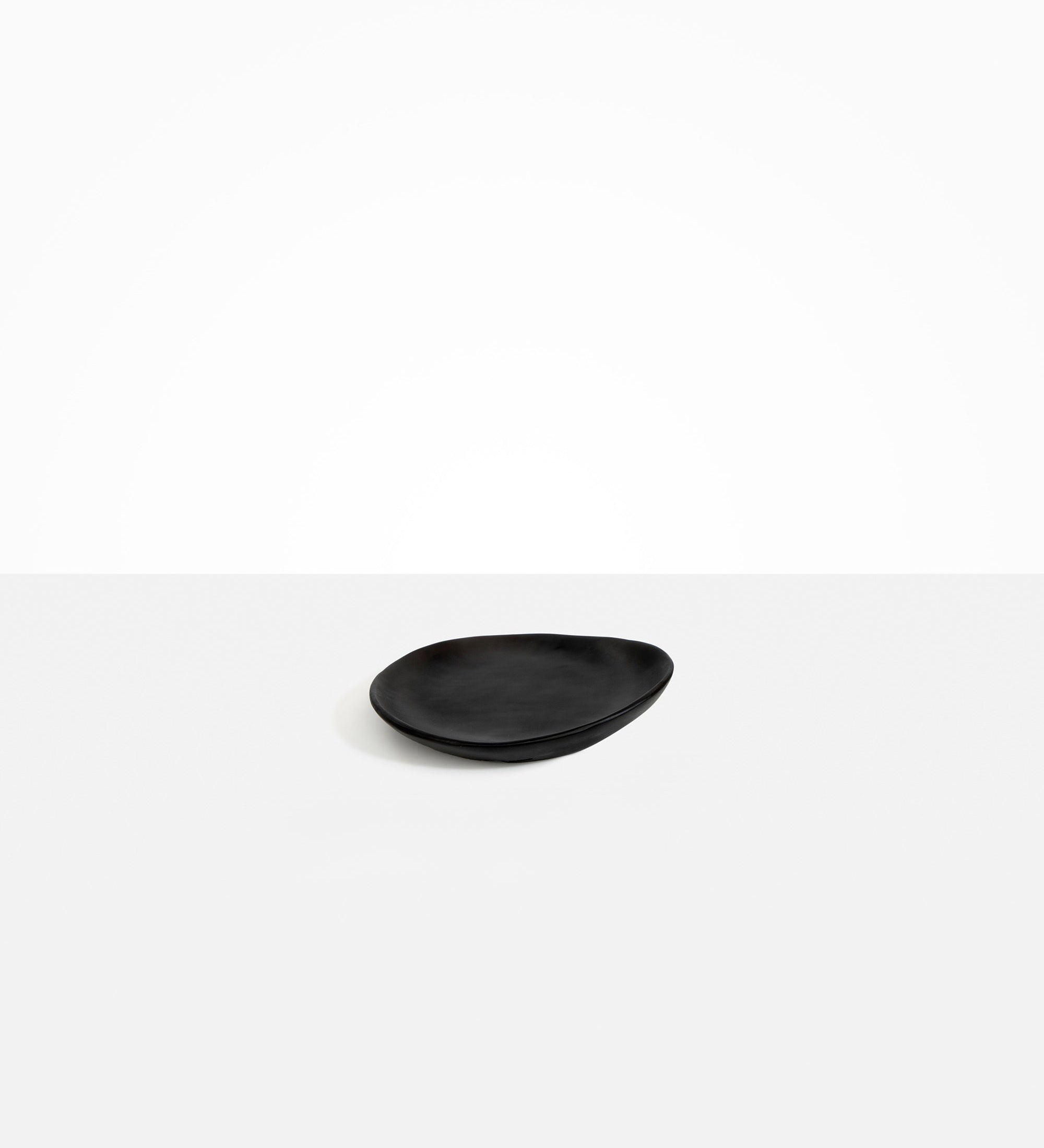 Dinosaur Designs Pebble Side Plate Serving Platters in Black color resin