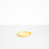 Dinosaur Designs Pebble Side Plate in Daisy Colour resin.
