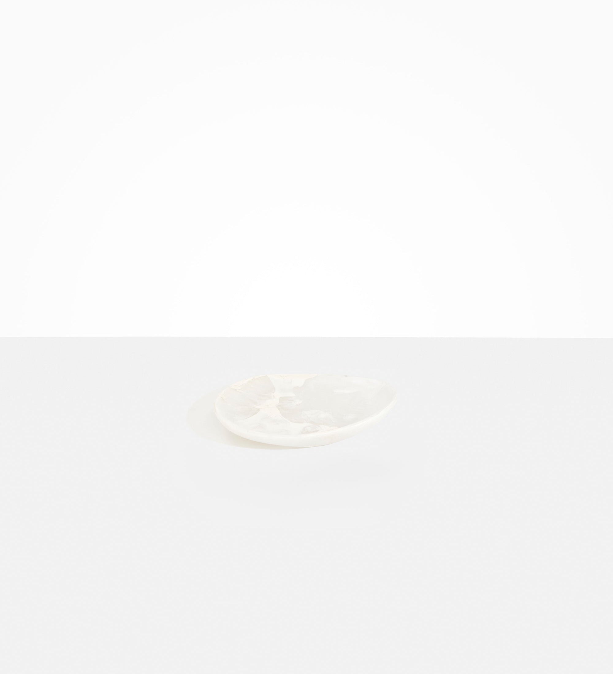 Dinosaur Designs Pebble Side Plate Serving Platters in Snow Swirl color resin