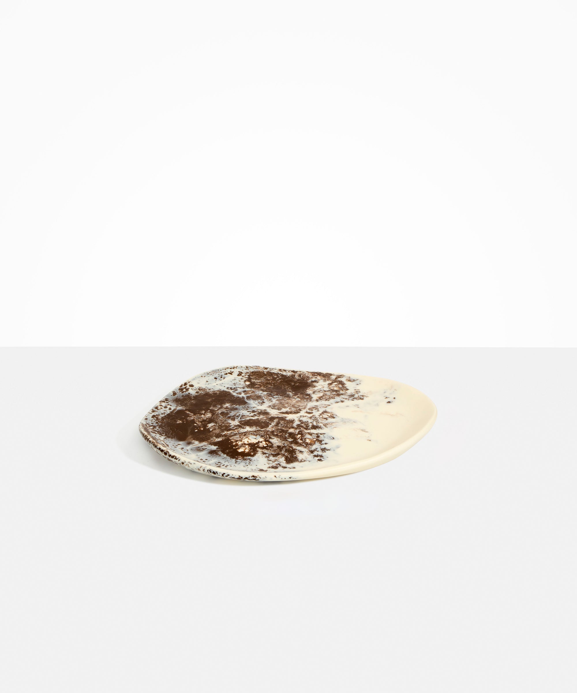 Dinosaur Designs Pebble Plate in Cappuccino Colour resin.