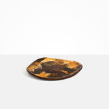 Dinosaur Designs Pebble Plate in Dark Horn Colour resin.