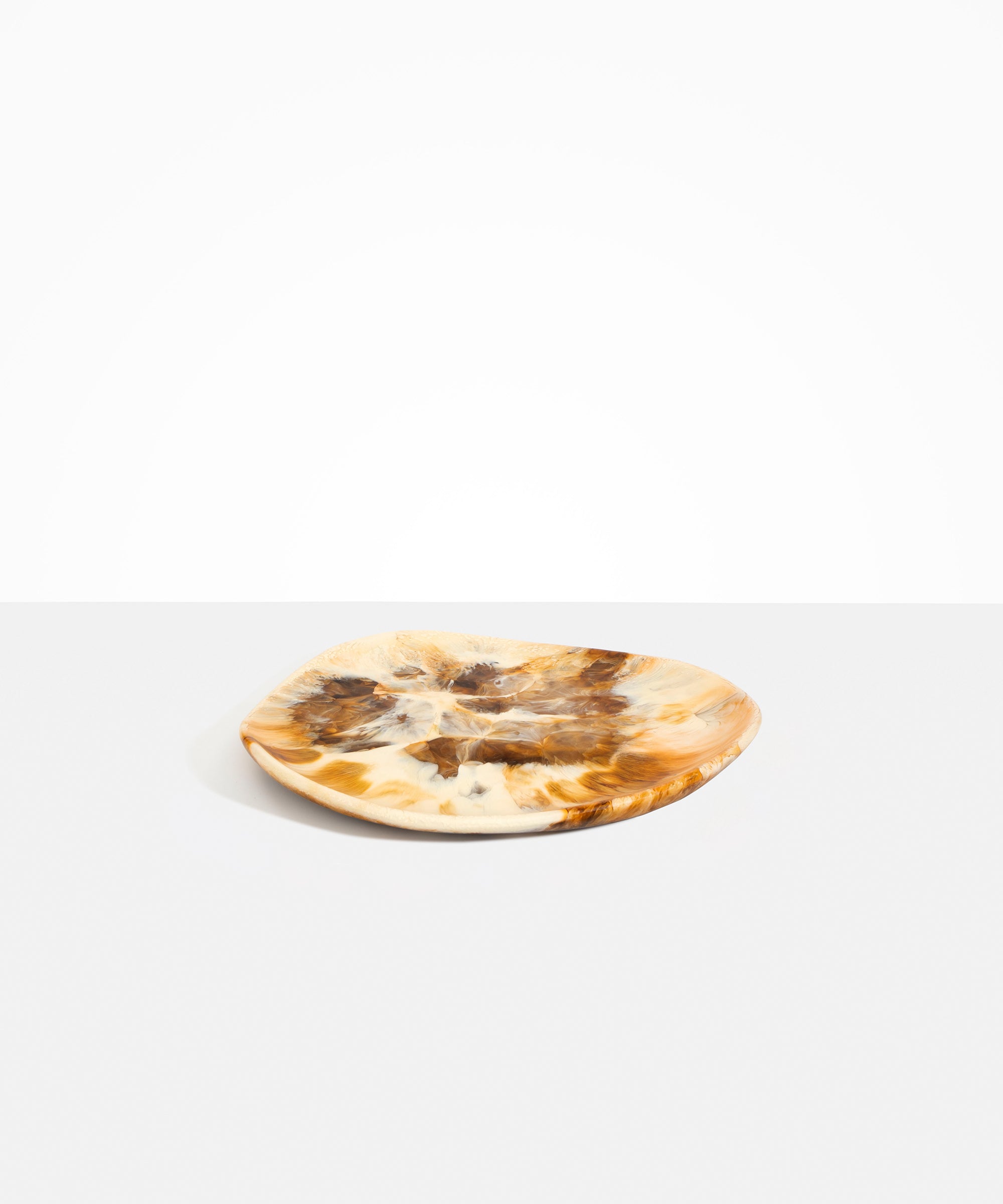 Dinosaur Designs Pebble Plate in Light Horn Colour resin.