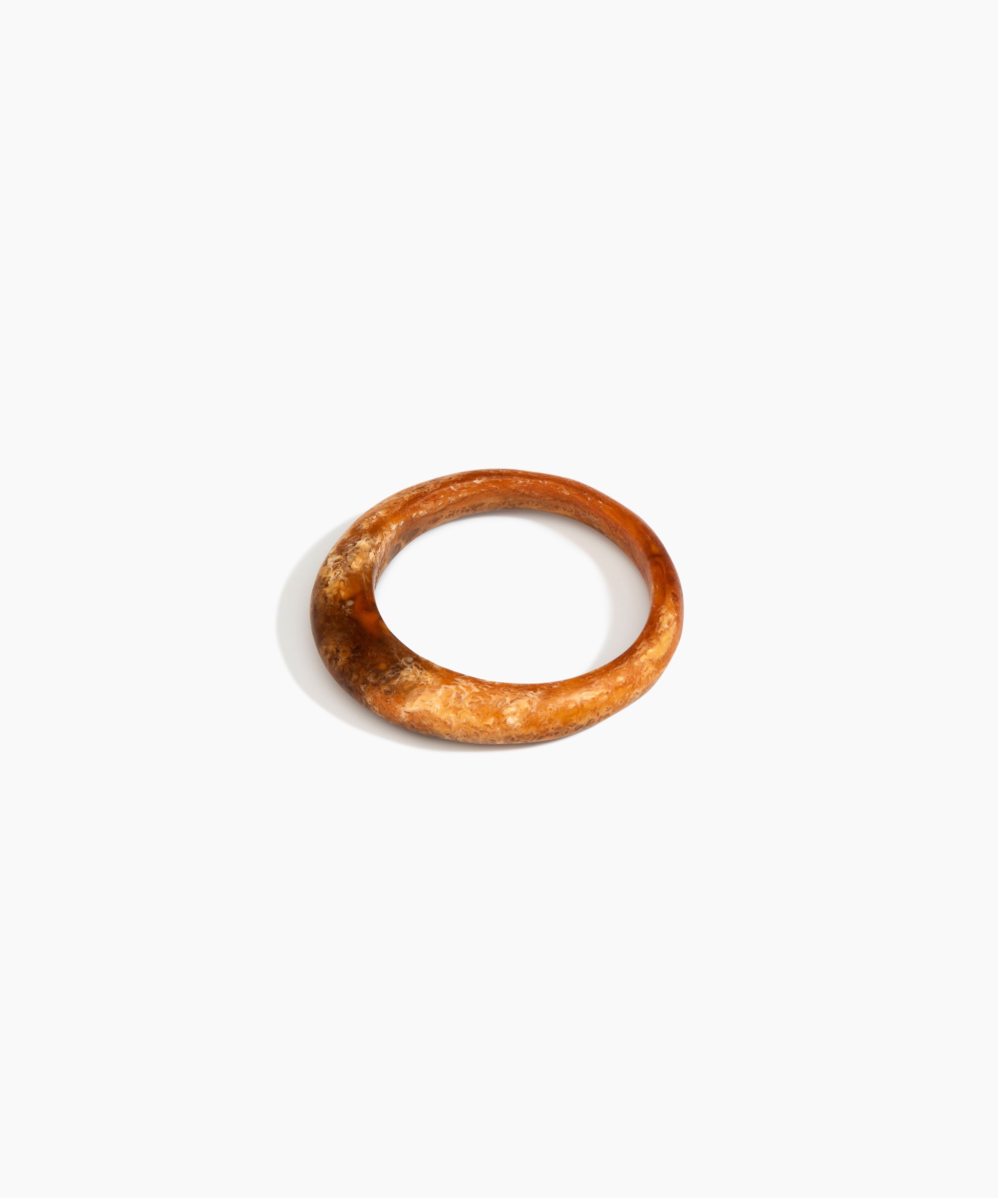 Dinosaur Designs Small Organic Bangle in Dark Horn Colour resin with Regular Fit.