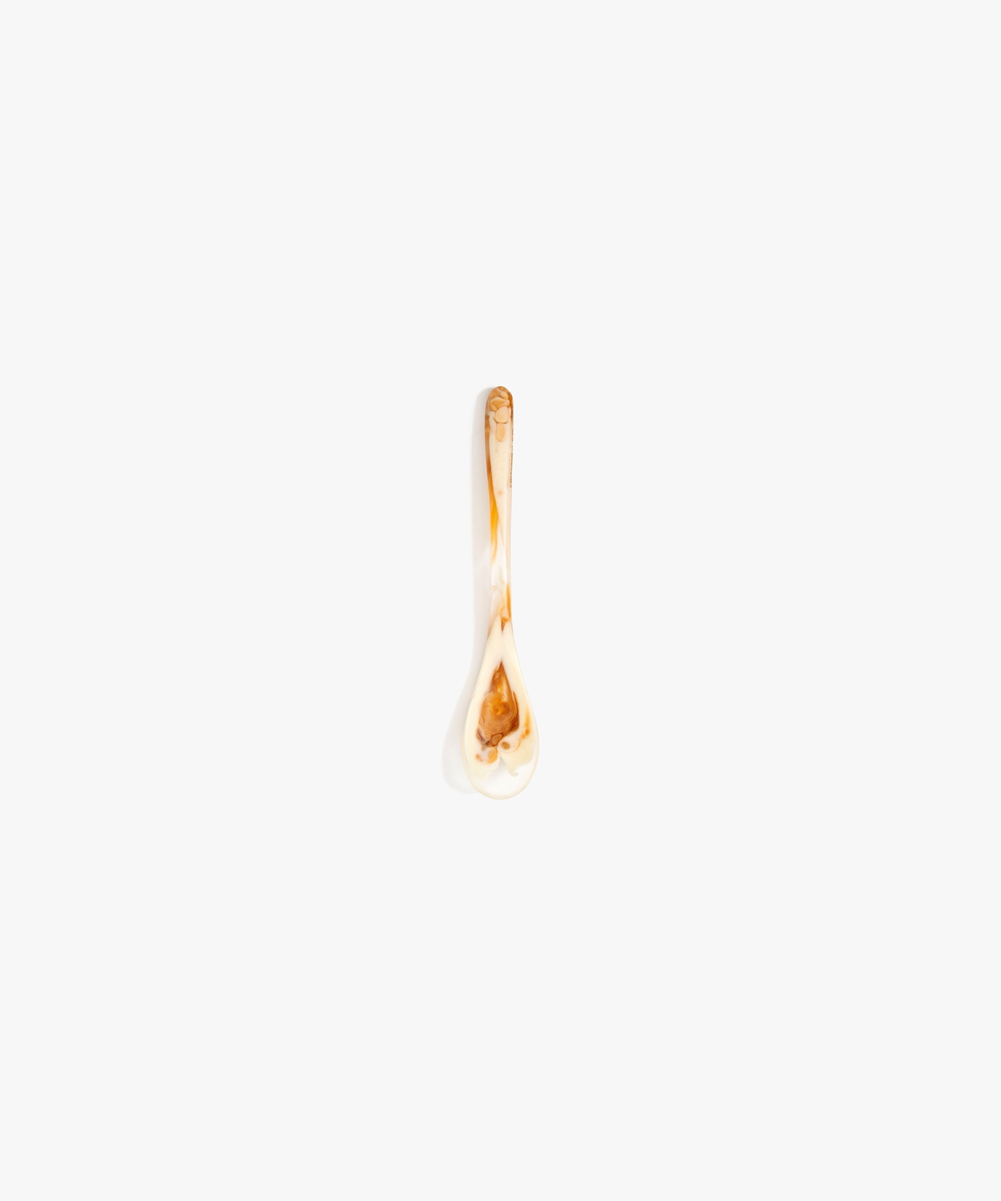 Dinosaur Designs Shell Spoon in Light Horn color resin