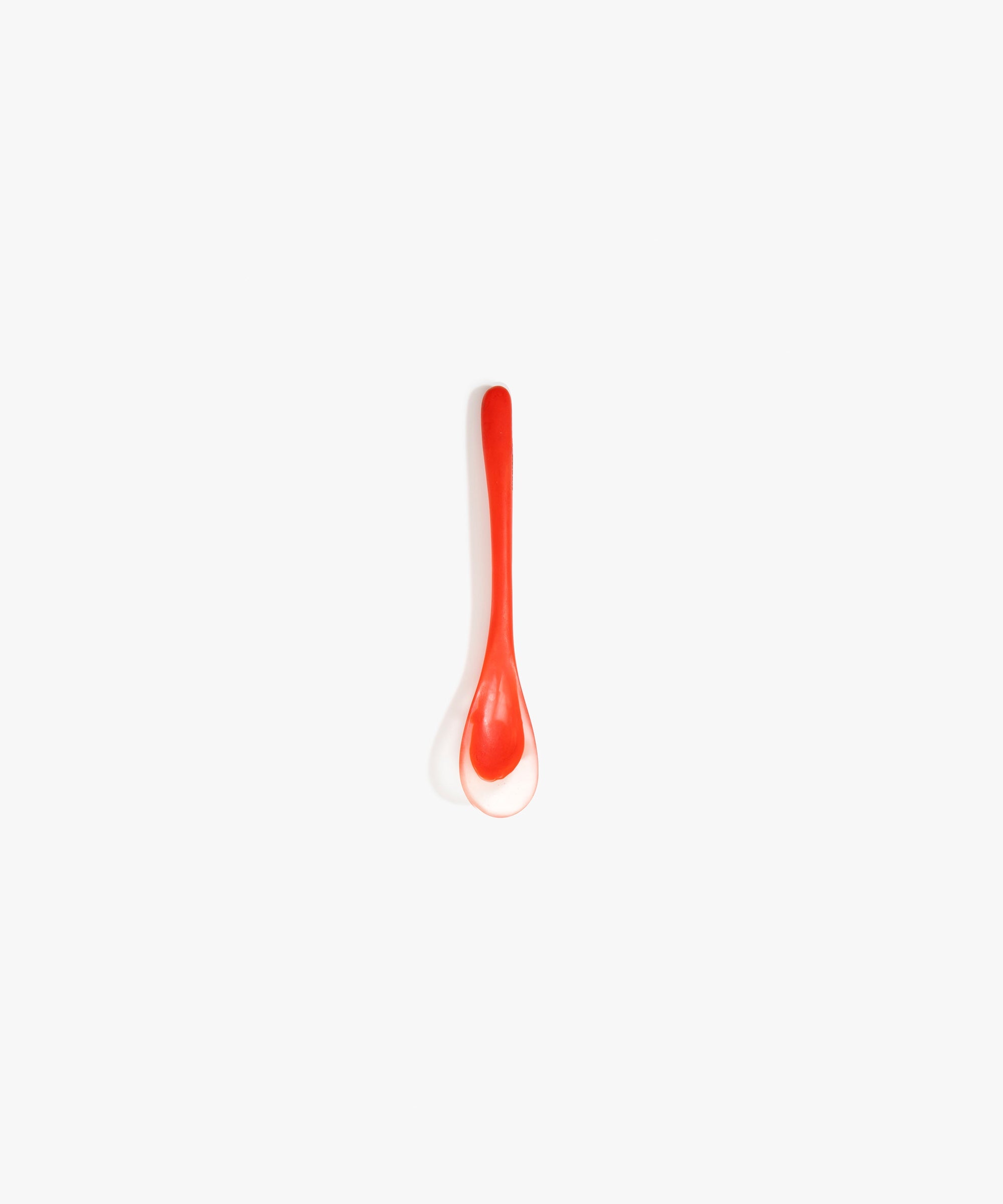 Dinosaur Designs Shell Spoon in Poppy Colour resin.