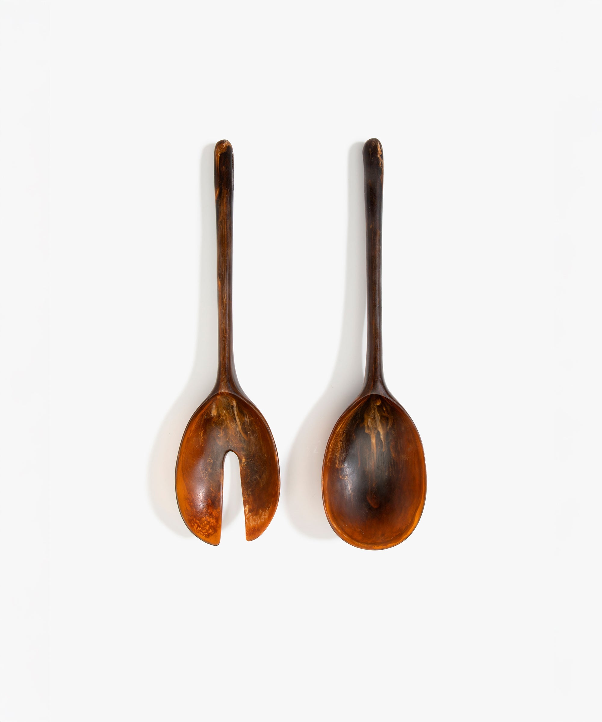 Dinosaur Designs Long Stone Servers in Dark Horn Colour resin.