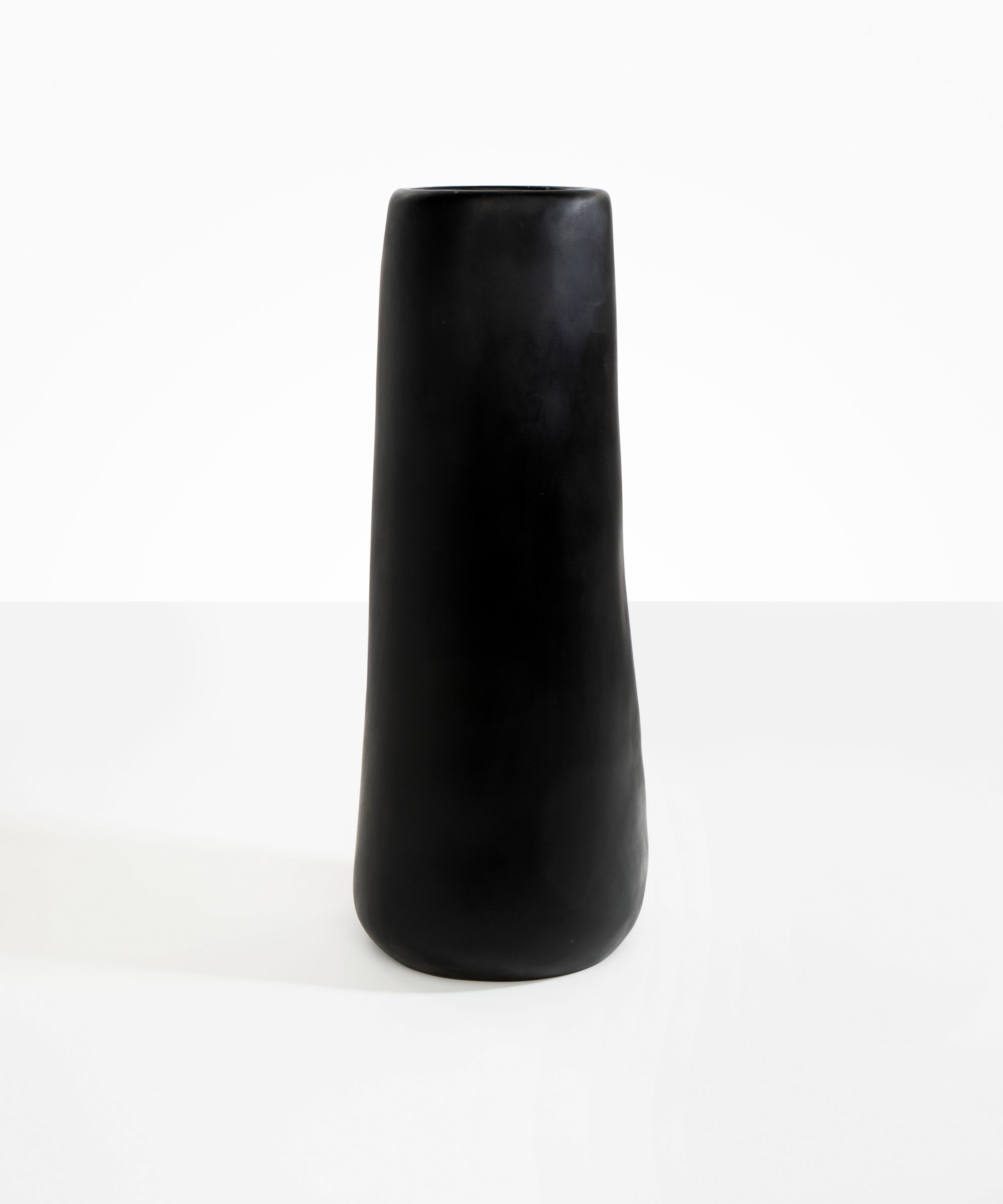 Dinosaur Designs Tall Pebble Vase in Black Colour resin.